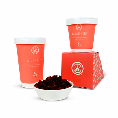 The Rose Hip Treat Cup features deep red hues and a rich texture, presented in an unadorned container, providing pets with a vibrant, vitamin-rich treat that's as healthy as it is colorful.